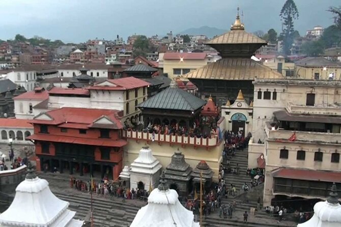 1 Day Kathmandu Valley Sightseeing Tour - Stop 1: Boudhanath Stupa and the Art of Not Rushing