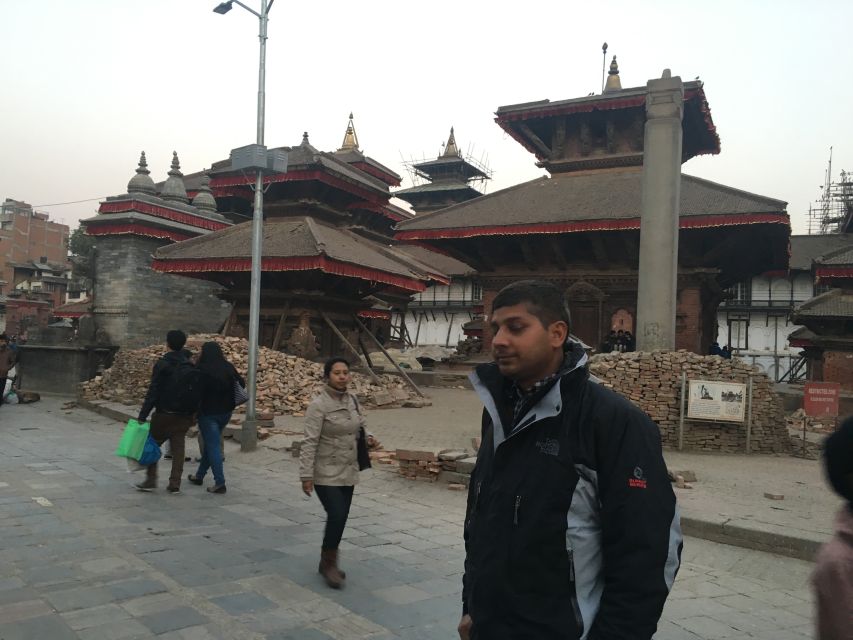 "Explore Kathmandu Rich Heritage: City Highlights Bus Tour" - Stop 1: Kathmandu Durbar Square for palace-courtyard energy