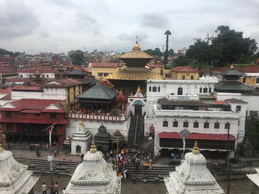 "Explore Kathmandu Rich Heritage: City Highlights Bus Tour" - Pashupatinath: riverfront atmosphere and strict boundaries
