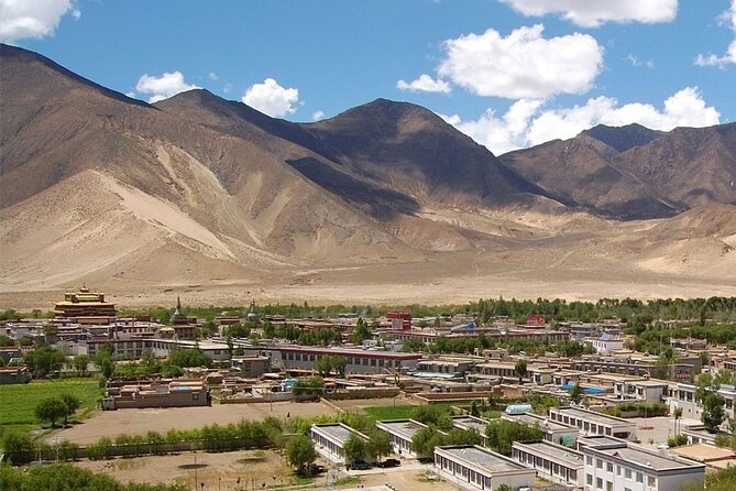 Fixed Departure Tibet Overland Group Joining Tours. - The road to Kerung and the first big altitude shift