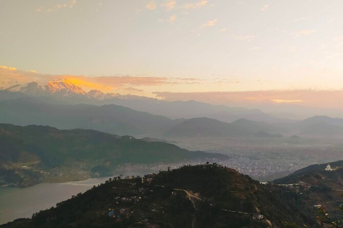 Kathmandu and Pokhara: A Journey Through Nepal's Cultural and Natural Wonders - Pokhara Day Trip style: Devi’s Fall, Gupteshwor Cave, and the Pagoda sunset