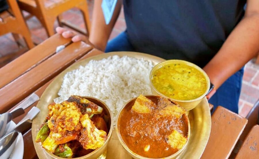 Kathmandu: Nepali Cooking Class with Hotel Pickup - The class atmosphere: folk music, phrases, and mealtime energy