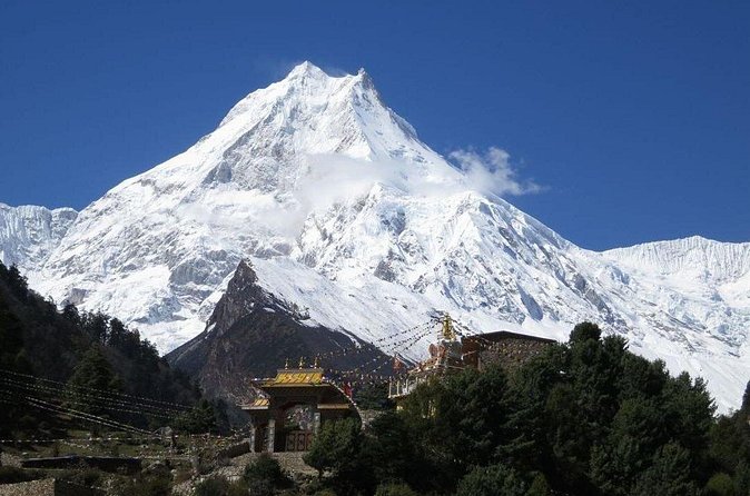 Manaslu Circuit Trek 13 Days - Machha Khola to Deng: river gorges, bridges, and the first taste of Buddhist Nepal