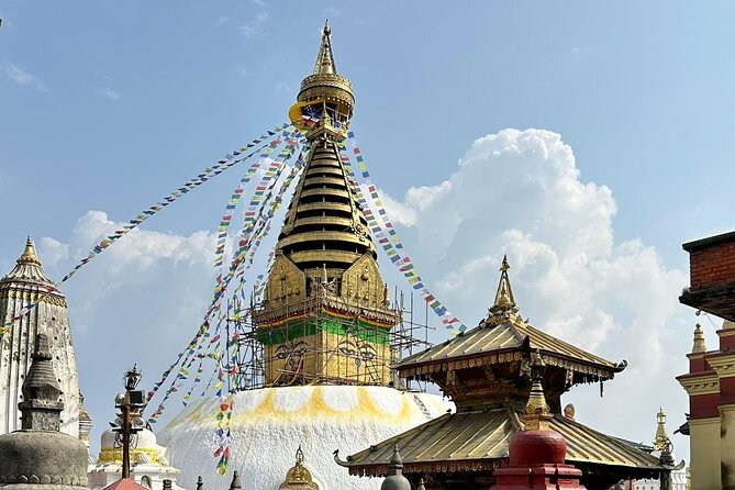 Private Kathmandu Day Tour - UNESCO World Heritage Sites - Swayambhunath Monkey Temple: a hilltop stupa with prayer wheels and Buddha details